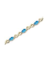 10K Yellow Gold Oval Blue Topaz and Diamond Bracelet
