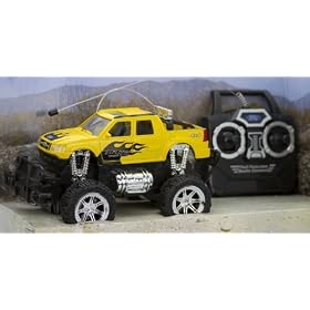 Click here to buy Ford Explorer Sport Trac 1:24 Radio Controlled 4x4 (Yellow) by Ford.