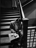 MIT Student Sitting in Stairwell to Fill Out Registration Forms For Second Semester Photographic Poster Print by Gjon Mili, 18x24