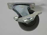 Swivel caster with brake and zinc coating, 2 diameter x 1  wide hard rubber wheel with plain bearing. 150 pound load capacity.
