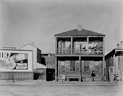 Billboard in Poor Neighborhood, New Orleans, 1935 - Evocative 16"x20" Photographic Print from the Library of Congress Collection