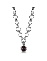 18KY & Sterling Silver This beautiful sterling silver and 18k yellow gold Sara Blaine necklace/pendant showcases a vibrant 14mm smokey topaz.