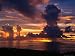 Sunset Over Harbor, Saipan Photographic Poster Print by Francie Manning, 32x24