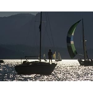 Backlit Boater Observes a Sailboat Race on Lake Tahoe, California Artists Photographic Poster Print, 18x24