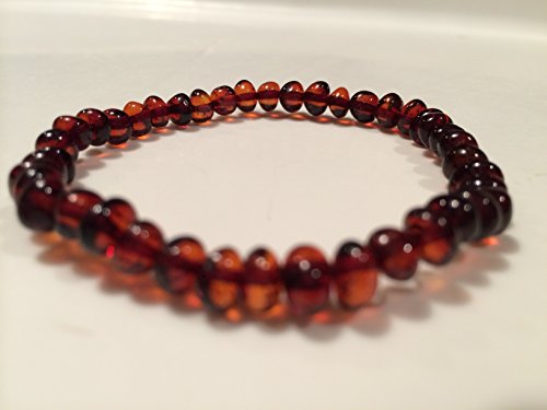 Healing Bracelet 8 inch arthritis carpal tunnel swelling headache Baltic Amber for Adults Baltic Amber Bracelet for Adults Polished Cherry Stretch Boy Girl Unisex Man Woman Certified Authentic. Anti-inflammatory, Reduction in Inflamation Symptoms Such As Carpal Tunnel, Back Aches, Head Aches, Tooth Aches, Swelling, General Aches and Pains. Highest Quality Helps with soothing and insomnia, stress, and some reflux & eczema.