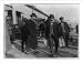 Historic Print (L): [Two men of the U.S. Internal Revenue Bureau(?) carrying packages...