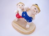 Beautiful lovely Mauy Thai figure, clay doll in "Choraked Faad Haang" position