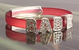 Image of Ladies fashion bling bracelet on pink or black soft plastic band - BABE - advise colour choice at time of order