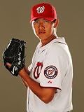 Washington Nationals Photo Day, VIERA, FL - FEBRUARY 25: Chien-Ming Wang Photographic Poster Print by Al Bello, 12x16