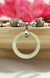 Jade Ring Pendant on a Velvet rope Choker Necklace Pendant Size: .85 Necklace length 16.5