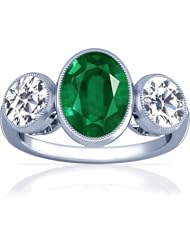 Platinum Oval Cut Emerald Three Stone Ring
