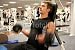 Wallmonkeys Peel and Stick Wall Decals - Personal Trainer Doing Biceps Curl - Removable Graphic