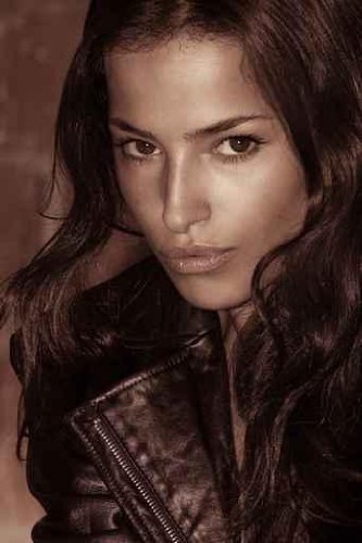 Beautiful Woman Portrait in Leather Jacket, outside 