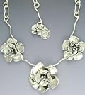 Necklace Oval Signature Chain with 3 Double Dogwoods, 1 1/4
