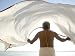Man Dries His Lungi in the Winds by the Ganges Art Photographic Poster Print by Gavin...