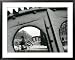 A Cyclist Passes a Draw Bridge as Snow Covers the City Center of Amsterdam Framed Art Poster Print, 39x31