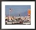 Cars Moving Along Congested Street, Littered with Signs, Billboards and Traffic Directives Framed Art Poster Print by Michael Rougier, 22x18
