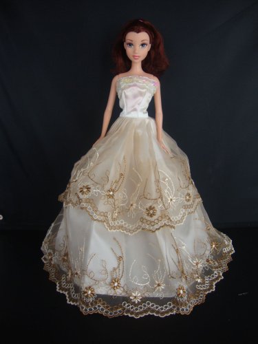A Ivory and Brown Ball Gown Made to Fit the Barbie Doll