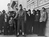 Soldier Standing Guard in Front of Japanese American Citizens Awaiting Transport to Relocation Camps Photographic Poster Print by Dorothea Lange, 16x12