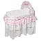 Burlington Baby Bassinet with 3 Ruffle Skirt, Pad Cover, Storage Underneath - White/ Pink