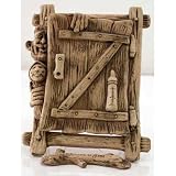 CERAMIC AMULET/Door to Domestic Happiness [Made in Russia. Size: 7 x 5.5 inches (17 x 13.5 cm). Material: ceramic (clay). Hand-crafted] [A small gnome holding a baby peeks around a door, on which there rests a bottle. This marvelous sculpture can be hung and add a touch of whimsy to any room in your house. Amulets, or talismans, possess a magical ability to defend their owners or improve various areas of their lives. They can protect against sickness, bad luck, and danger; they can also bring success, luck, love, money, and more. This gnome - hand-sculpted from natural clay - will tirelessly defend you and your loved ones from any sort of misfortune!]