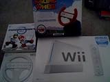 Nintendo Wii Console System with Wii Sports/Mart Kart Video game with 2 Wheels/Plus Extra Red/Blue Dreamgear Wheel
