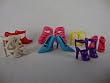 7 Pairs of Shoes Made to Fit the Barbie Doll