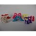 7 Pairs of Shoes Made to Fit the Barbie Doll