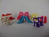 7 Pairs of Shoes Made to Fit the Barbie Doll