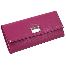 Vibrant pink colored leather jewelry roll by Wolf Designs