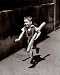 Petit Parisien by Willy Ronis. Size 10.00 inches width by 12.00 inches height. High Quality Art Poster Print