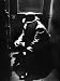 Commuter on the New York New Haven Line Riding Between Cars Photographic Poster Print by Alfred Eisenstaedt, 12x16