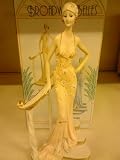 Click for more about broadway belles - lady standing on stairs figurine - widdop.