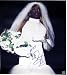 Dennis Rodman Autographed/Hand Signed Wedding Dress 16x20 Photo with Mrs Inscription