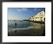 A Beach Goer Wades into the Calm Surf of Cadaques National Geographic Collection Fram...