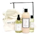 The Laundress Pet Gift Bag includes: Le Chien et Le Chat, Cedar, 16 oz, Cedar Fabric Fresh, 8 oz, Stain Solution, 4 oz, Hotel Laundry Bag