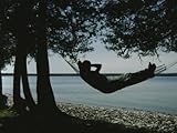 IMAGE OF A Person Relaxes in a Hammock That Overlooks Lake Michigan Stretched Canvas Poster Print, 24x32