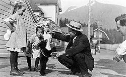 Admiring Cute Bear Cub, Alaska, ca. 1915 Photograph - Beautiful 16"x20" Photographic Print from the Library of Congress Collection
