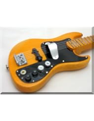 From Amazon.com. Click for details:
 Musical Instruments: MARCUS MILLER Miniature Mini JAZZ Bass 5-string - ARTSTUDIO35 Musical Instruments: MARCUS MILLER Miniature Mini JAZZ Bass 5-string - ARTSTUDIO35