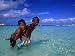 Young Boys Playing in Water at White Beach, Boracay Island, Aklan, Philippines Lonely Planet Collection Photographic Poster Print by Mark Daffey, 24x18