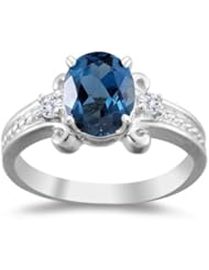 0.09 Cts Diamond & 2.03 Cts London Blue Topaz Ring in 14K White Gold