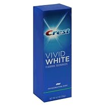 Crest Vivid White Fluoride Toothpaste, Invigorating Mint, 4.1-Ounce Tubes (Pack of 4)