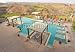 Wallmonkeys Peel and Stick Wall Decals - Luxury Pool Spa with Pergolas and View of a Golf Course - Removable Graphic