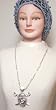 Hand Crocheted Light Blue Rayon Cotton Gimp Large Gloria Snood for Women Trimmed with Fire Polished Gunmetal Color Beads Offered in Combination with Sterling Silver Long Chain Charm Necklace with Viking Head Pendant