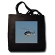 VWPics Helicopter - Helicopter hovers in blue sky - Tote Bags
