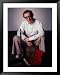 Filmmaker Woody Allen Sitting on Sofa with His Clarinet and an Open Clarinet Case at His Feet Framed Art Poster Print by Ted Thai, 33x41