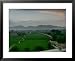 An Afghan Man Rides His Bicycle on a Dirt Road on the Northern Edge of Kabul, Afghanistan Associated Press Collection Framed Art Poster Print by David Guttenfelder, 31x25