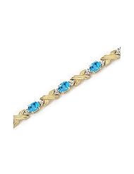 14K Yellow Gold Oval Blue Topaz and Diamond Bracelet by Jewelry Mountain