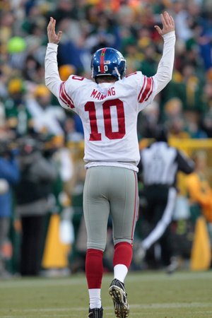 Green Bay Packers and New York Giants: Eli Manning Photographic Poster Print by Mike Roemer, 12x18