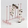 pink coloured boot stand